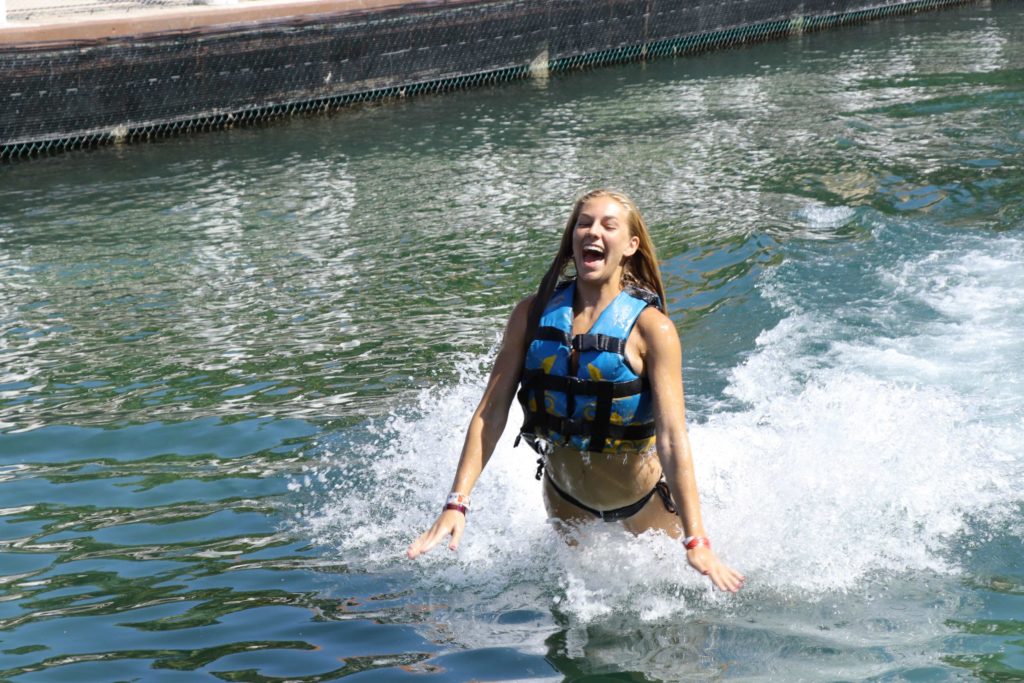 lex swimming with dolphins